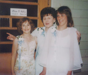 Kris (Hoepfl) Ruppin, left, teacher, Mary Schultz, center, and Jane (Hapke) Barwick, right, are pictured at their eighth grade graduation from St. Matthias School, Milwaukee, in 1980. Both Ruppin and Barwick have children currently enrolled at St. Matthias School. (Submitted photo courtesy Kris Ruppin)