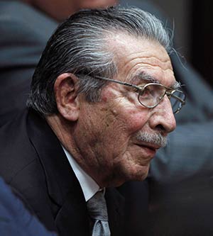 Former Guatemalan dictator Efrain Rios Montt attends a hearing in the Supreme Court of Justice in Guatemala City Jan. 28. A judge ruled that the former dictator, who presided over one of the bloodiest periods of Guatemala's civil war, will stand trial on charges he ordered the murder, torture and displacement of thousands of Mayan Indians. (CNS photo/Jorge Dan Lopez, Reuters)