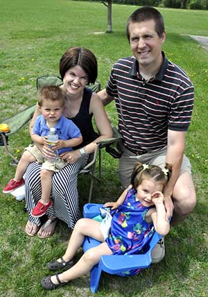 Ashley Schmidt is pictured with her husband, Jack, and children, Whitney, 3, and Wells, 1. (Catholic Herald photo by John Kimpel)