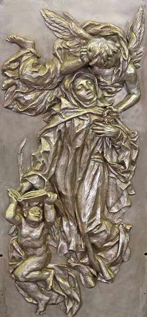 Teresa of Avila is seen on a bronze door panel to be installed at Holy Hill. (Catholic Herald photo by Steve Wideman)