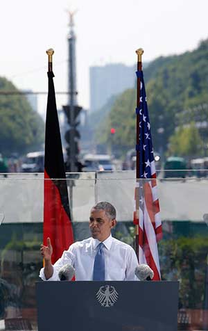 U.S. President Barack Obama speaks to a German audience in front of the Brandenburg Gate in Berlin June 19. Obama's call during the speech for additional cuts in the nuclear arsenals of the United States and Russia was lauded across the Catholic community. (CNS photo/Fabrizio Bensch, Reuters) 