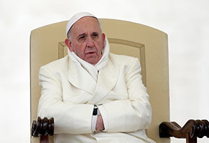 [b]Pope Francis[/b] leads his weekly audience in St. Peter's Square at the Vatican Nov. 27. Four days later, in a visit to a parish on the outskirts of Rome, Pope Francis revealed he worked as a bouncer as a young man. [i](CNS photo/Max Rossi, Reuters)[/i]
