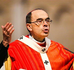 French Cardinal Philippe Barbarin celebrates Good Friday Mass March 25 at the cathedral in Lyon. Cardinal Barbarin has pledged full compliance with law enforcement officials in connection with sexual abuse by clergy. (CNS photo/Robert Pratta, Reuters)