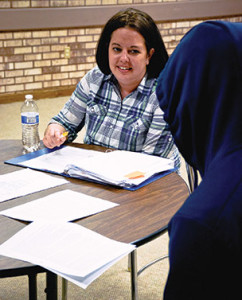 Julie Smith, a social worker at the Carmelite Home for Boys, works with adolescents during a group therapy session, Wednesday, March 30. (Catholic Herald photo by Juan C. Medina)