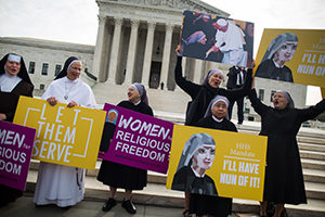 Women religious demonstrate March 23 against the Affordable Care Act's contraceptive mandate outside the U.S. Supreme Court in Washington. A brief filed by Catholic theologians could impact the court's efforts to seek a compromise. (CNS photo/Jim Lo Scalzo, EPA)