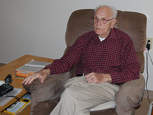 At 102, William J. Koehn continues to lead an active life. Every Monday, he prays the rosary with fellow Library Square residents; on Friday he attends Mass celebrated by retired priests.
