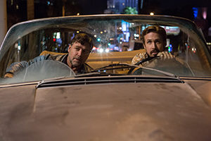 Russell Crowe and Ryan Gosling star in a scene from the movie "The Nice Guys." he Catholic News Service classification is O -- morally offensive. The Motion Picture Association of America rating is R -- restricted. Under 17 requires accompanying parent or adult guardian. (CNS photo/Warner Bros.)