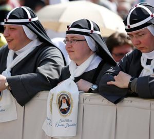 Bridgettine sisters attend the canonization Mass for two new saints celebrated by Pope Francis in St. Peter's Square at the Vatican June 5. Those canonized were St. Stanislaus Papczynski of Poland, founder of the Marian Fathers of the Immaculate Conception, and St. Mary Elizabeth Hesselblad of Sweden, who refounded the Bridgettine order that had died out in Sweden after the Protestant Reformation. (CNS photo/Paul Haring)