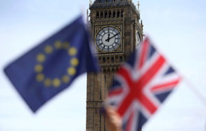 A European Union flag and British Union flag are seen at Parliament Square in London June 19. Voters in the United Kingdom voted June 23 to leave the European Union. (CNS photo/Neil Hall, Reuters)