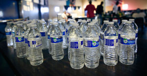 Water bottles are set out for the taking at the Society of St. Vincent de Paul dining hall in downtown Phoenix June 4 when the temperature reached 115 degrees. Open regularly for breakfast and lunch, the hall extends its hours into the late afternoon and night to provide needed refuge for the homeless during the Phoenix metro area's periods of excessive heat. (CNS photo/Nancy Wiechec)