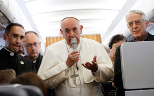 Pope Francis speaks to journalists aboard his flight from Rome to Yerevan, Armenia, June 24. The pope was beginning a three-day visit to Armenia. (CNS photo/Paul Haring)
