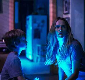 Gabriel Bateman and Teresa Palmer star in a scene from the movie “Lights Out.” The Catholic News Service classification is L – limited adult audience, films whose problematic content many adults would find troubling. The Motion Picture Association of America rating is PG-13 – parents strongly cautioned. Some material may be inappropriate for children under 13. (CNS photo/Warner Bros.)