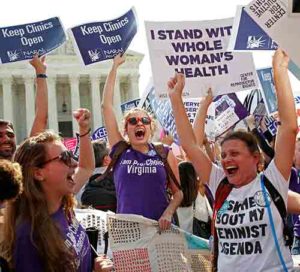 Supporters of keeping abortion legal celebrate outside the U.S. Supreme Court in Washington June 27. The Supreme Court ruled 5-3 in Whole Woman's Health v. Hellerstedt, striking down two provisions of a 2013 Texas law regulating abortion in that state. (CNS photo/Kevin Lamarque, Reuters)