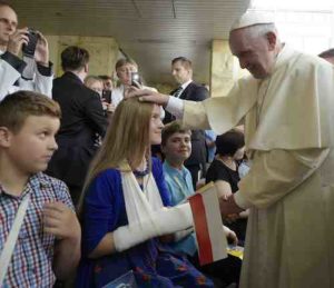 Pope Francis blesses children during a visit to the Children's University Hospital in Krakow, Poland, July 29. (CNS photo/L'Osservatore Romano via Reuters) See POPE-POLAND-CHILDREN-HOSPITAL July 29, 2016. Editor's note: For editorial use only.