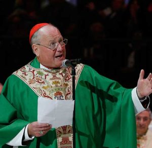 Cardinal Timothy M. Dolan of New York addresses Pope Francis at the conclusion of Mass at Madison Square Garden in New York Sept. 25. (CNS photo/Paul Haring)