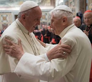 Pope Francis greets retired Pope Benedict XVI during a June 28 ceremony at the Vatican marking the 65th anniversary of the retired pope’s priestly ordination. (CNS photo/L’Osservatore Romano, handout)