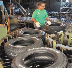 Tires leave the curing presses in Union City, Tenn., in this 2010 file photo. (CNS photo/Goodyear via EPA)