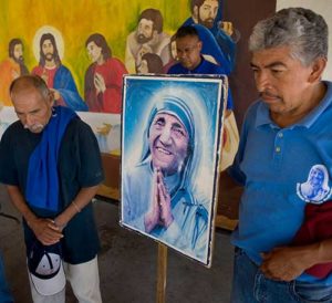Recovering addicts pray at the sanctuary of Blessed Teresa of Kolkata Aug. 21 in Tijuana, Mexico. They are part of a group doing spiritual and community service with the Missionaries of Charity. Mother Teresa will be canonized Sept. 4 at the Vatican. (CNS photo/David Maung)