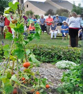 parishioners from St. Joan of Arc Parish, Nashotah, and St. Catherine of Alexandria Parish, Oconomowoc, weed and harvest produce, Aug. 24, from the parishes’ 1,500-square foot Garden of Eat’n, which produces 500 pounds of produce annually. (Catholic Herald photo by John Kimpel)