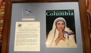 Monica Atkinson, a retired teacher from St. Matthias School, Milwaukee, has framed the letter and medal sent to her and her students by Mother Teresa in 1992. (Submitted photo courtesy Monica Atkinson)