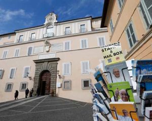 Postcards showing Pope Francis are seen outside the papal villa at Castel Gandolfo, Italy, Oct. 21. Private areas of the papal villa are now open to the public. Although many popes over the centuries have spent their summers at Castel Gandolfo, Pope Francis has chosen to remain in Rome. (CNS photo/Paul Haring)