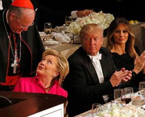 Republican U.S. presidential nominee Donald Trump and his wife, Melania Trump, watch as New York Cardinal Timothy M. Dolan speaks with Democratic presidential nominee Hillary Clinton during the 71st annual Alfred E. Smith Memorial Foundation Dinner at the Waldorf Astoria hotel in New York City Oct. 20. The charity gala, which honors the memory of the former New York Democratic governor who was the first Catholic nominated by a major political party for the U.S. presidency, raises money to support not-for-profit organizations that serve children in need. (CNS photo/Gregory A. Shemitz)