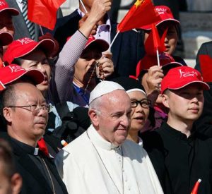 Pope Francis greets pilgrims from China during his general audience in St. Peter’s Square at the Vatican Oct. 5. (CNS photo/Paul Haring)