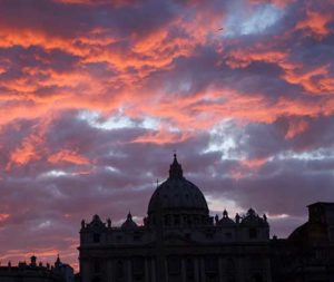 St. Peter’s Basilica is seen during sunset in Rome in this Oct. 20, 2011, file photo. Pope Francis has approved revised norms for the Congregation for Saints’ Causes regarding medical consultations on healings alleged to be miracles. (CNS photo/Paul Haring)