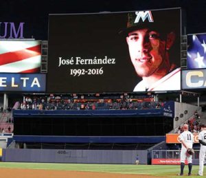 A moment of silence is observed for Miami Marlins Jose Fernandez prior to the New York Yankees taking on the Boston Red Sox Sept. 27 at Yankee Stadium. The 24-year-old pitcher, who defected from Cuba at 15 and went on to become one of baseball's brightest stars, was killed Sept. 25 in a boating accident in Miami Beach, along with two other men. (CNS photo/Adam Hunger, USA TODAY Sports via Reuters)