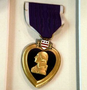 A close-up of the Purple Heart awarded to Private Boleslaw Adamski during his service in World War I. It was located on eBay before being returned to Adamski’s  family in August. (Catholic Herald photo by Allen Fredrickson)