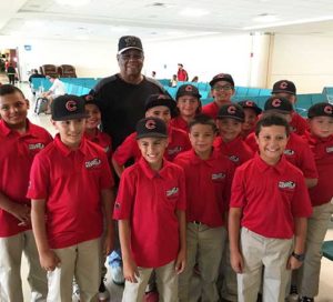 Former Major League Baseball star Felix Mantilla is shown with the Criollos, a team of 10 and 11-year-olds who play for the Journey House’s Felix Mantilla Little League. The group traveled to Puerto Rico for an education and cultural exchange experience in August.